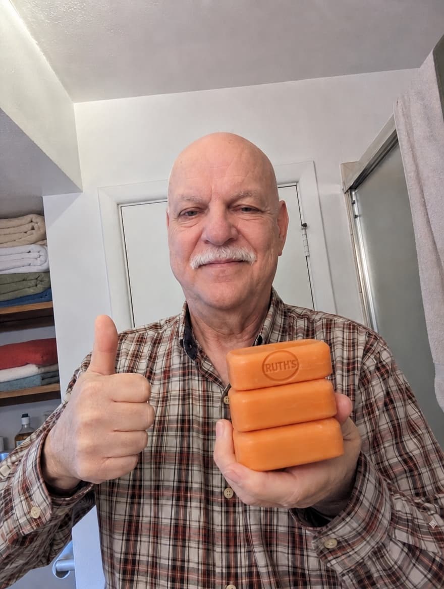 Harold holding the soap bar